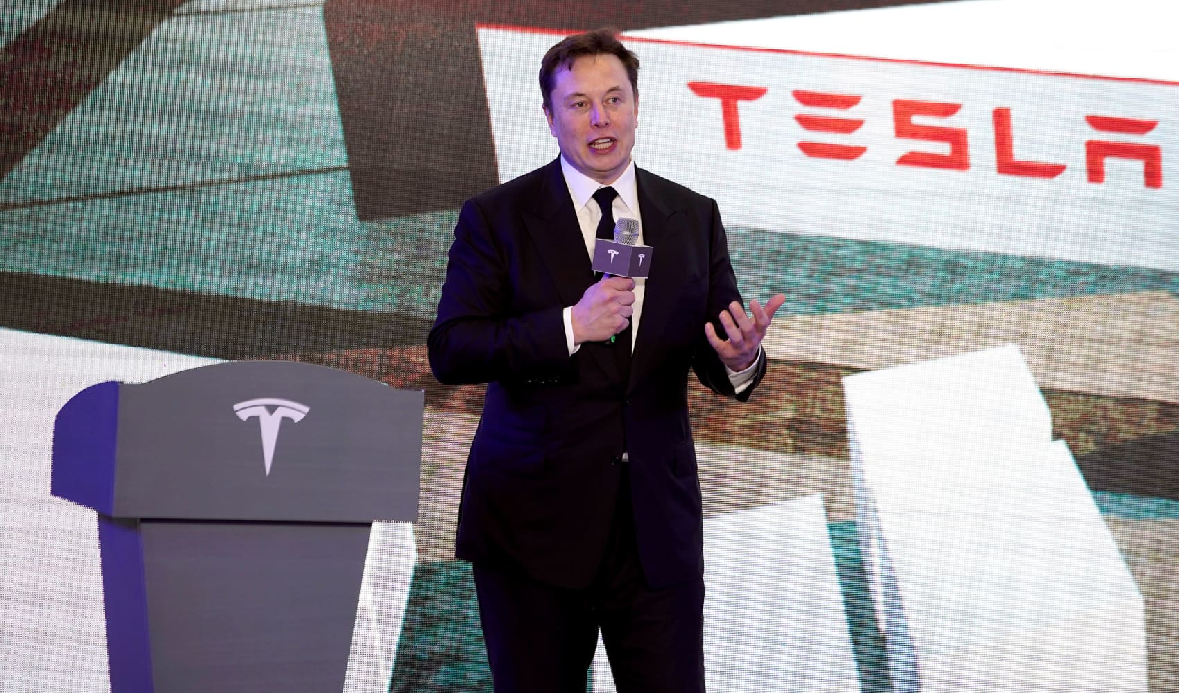 Tesla CEO Elon Musk speaks at an opening ceremony for Tesla China-made Model Y program in Shanghai on Jan. 7.
